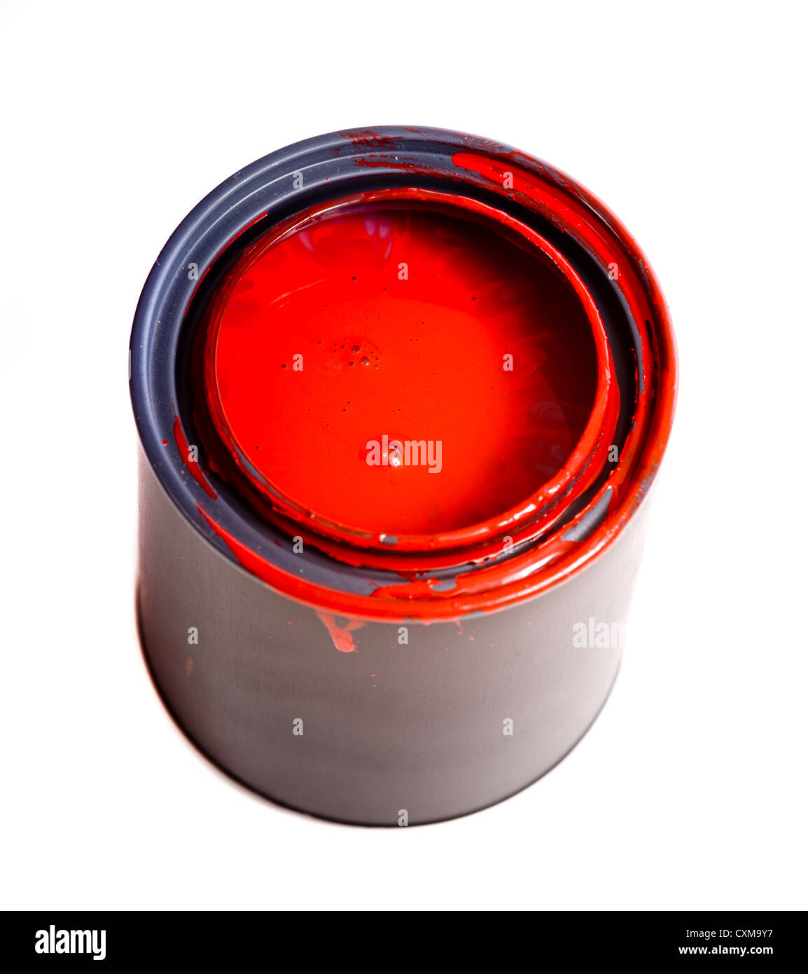 Colorful can of red paint on a white background with space for copy etc