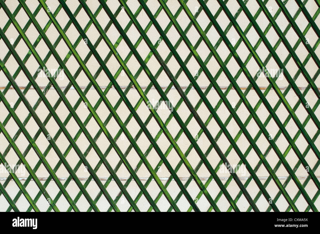 Green wooden lattice wall. Stock Photo