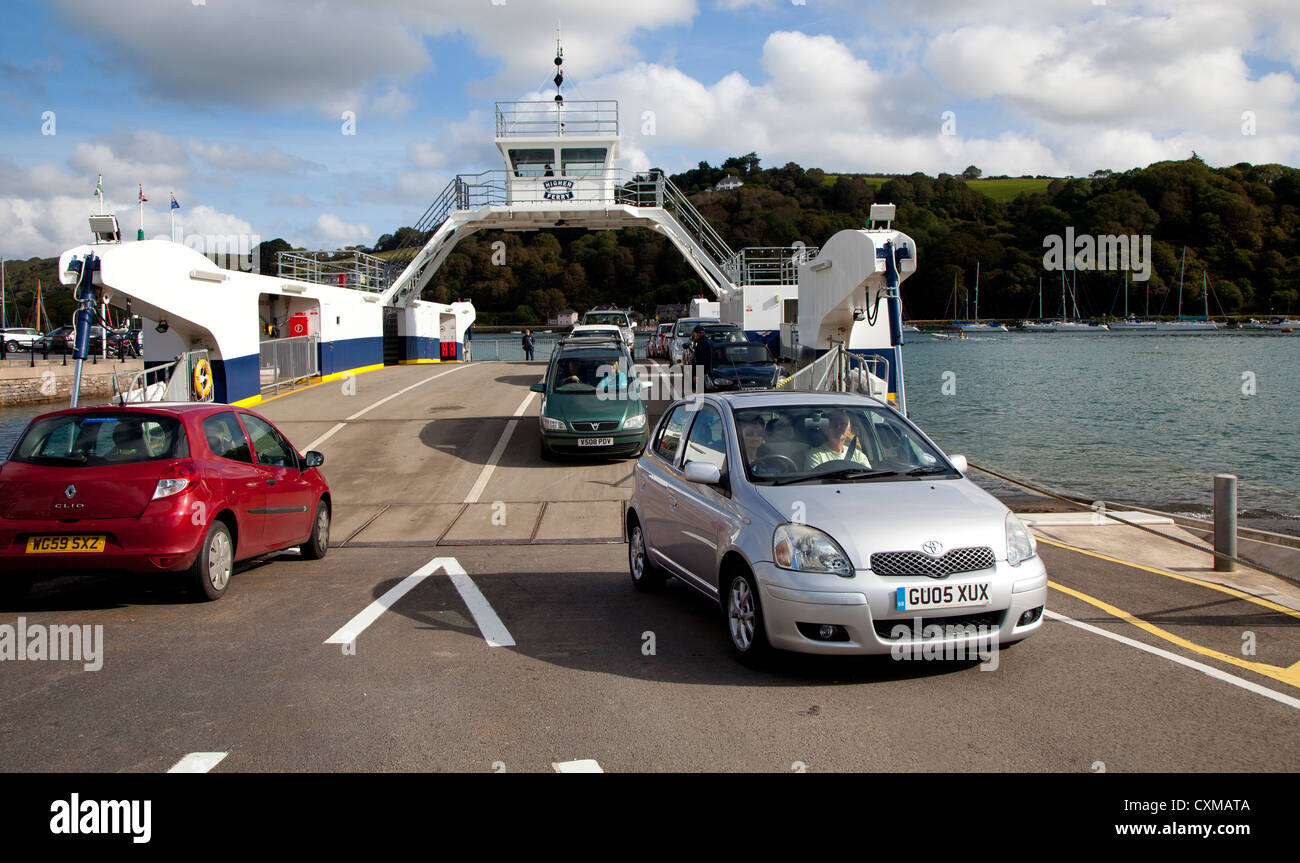 Higher Ferry,  Dart River,  with passenger cars unloading off the moored ferry. Stock Photo
