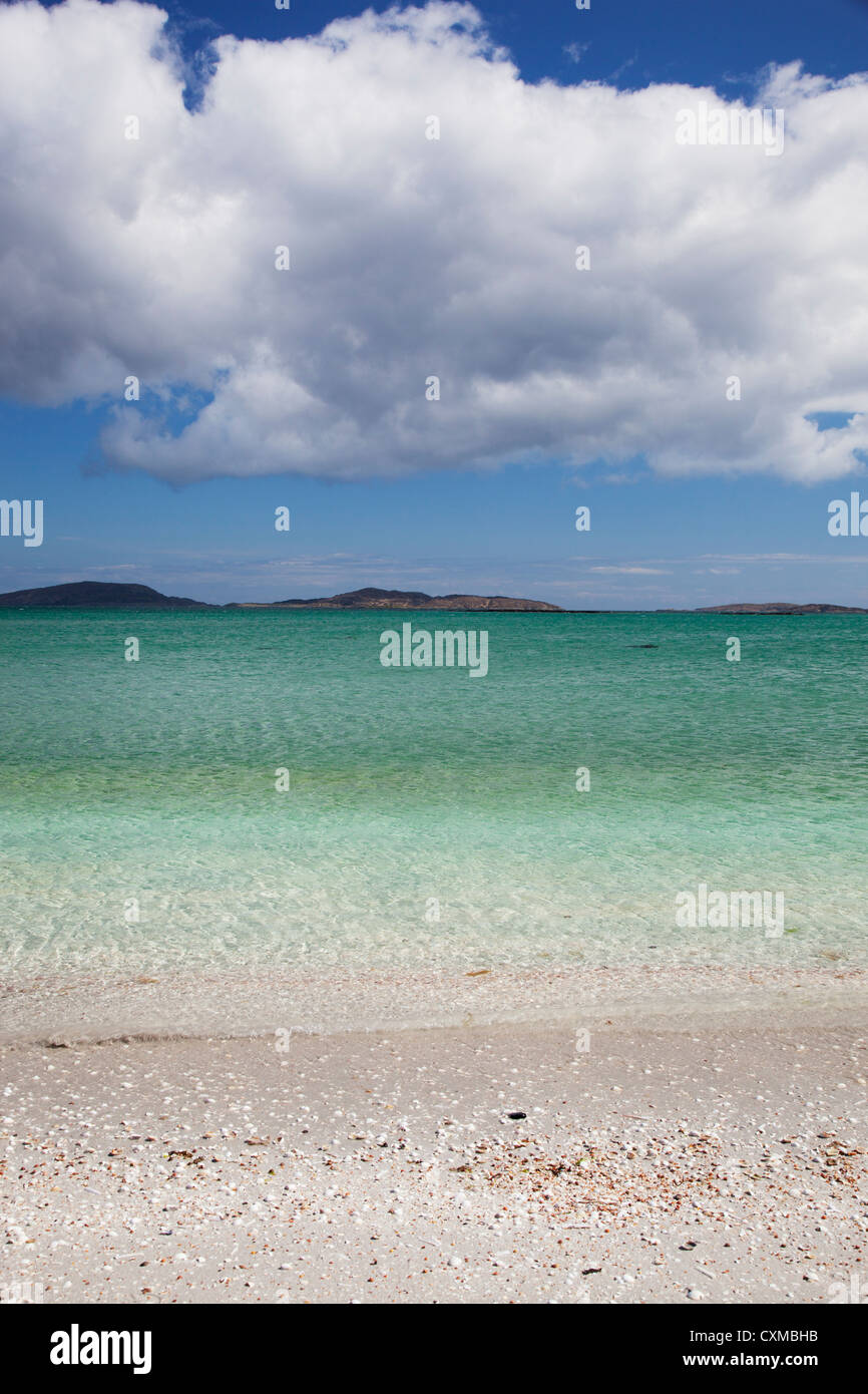 View out to sea from the sandy cockle strewn bay of Traigh Cille-bharra on the Isle of Barra, Outer Hebrides, Scotland, UK Stock Photo