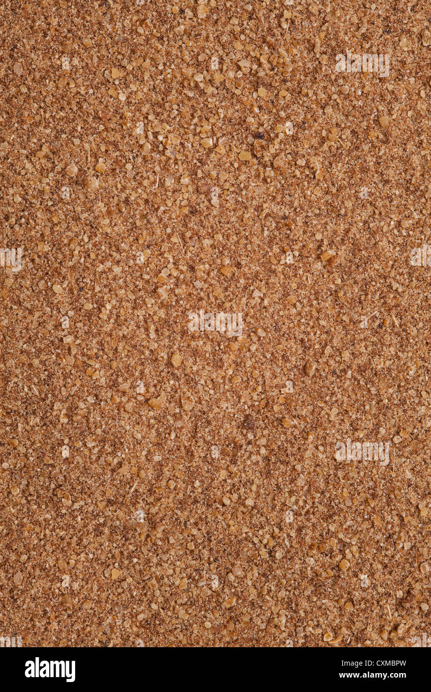 ground anise background, brown grain powder backdrop Stock Photo
