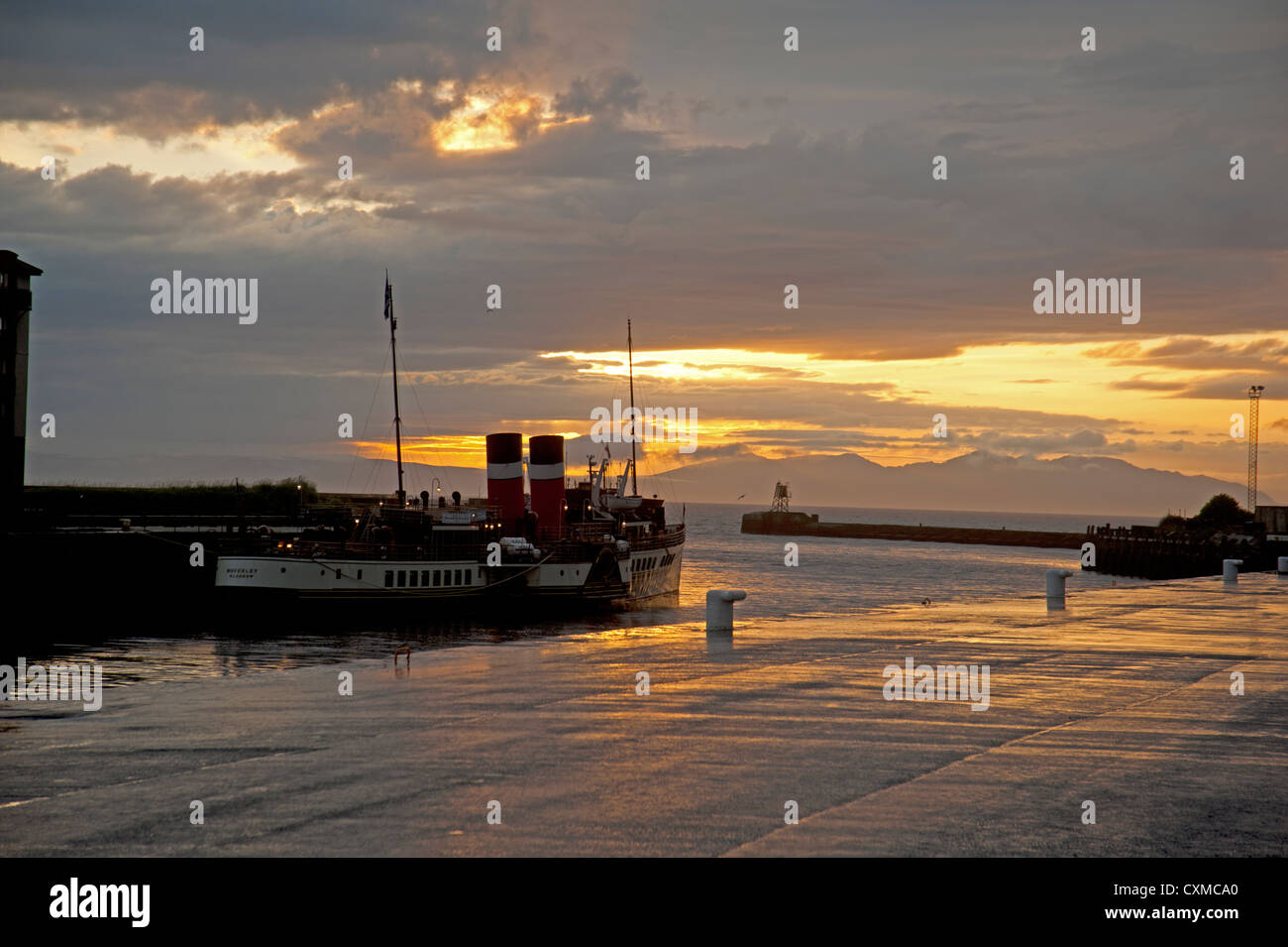Sunset over Ayr harbour and the Waverly paddle steamer on the Firth of Clyde, Scotland.   SCO 8600 Stock Photo