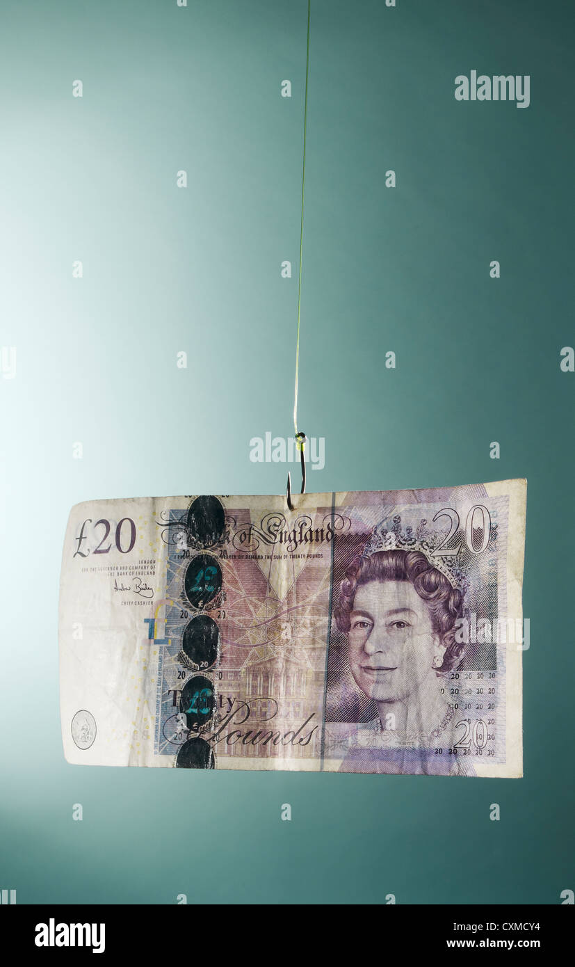 twenty pound note hooked on a fishing line Stock Photo