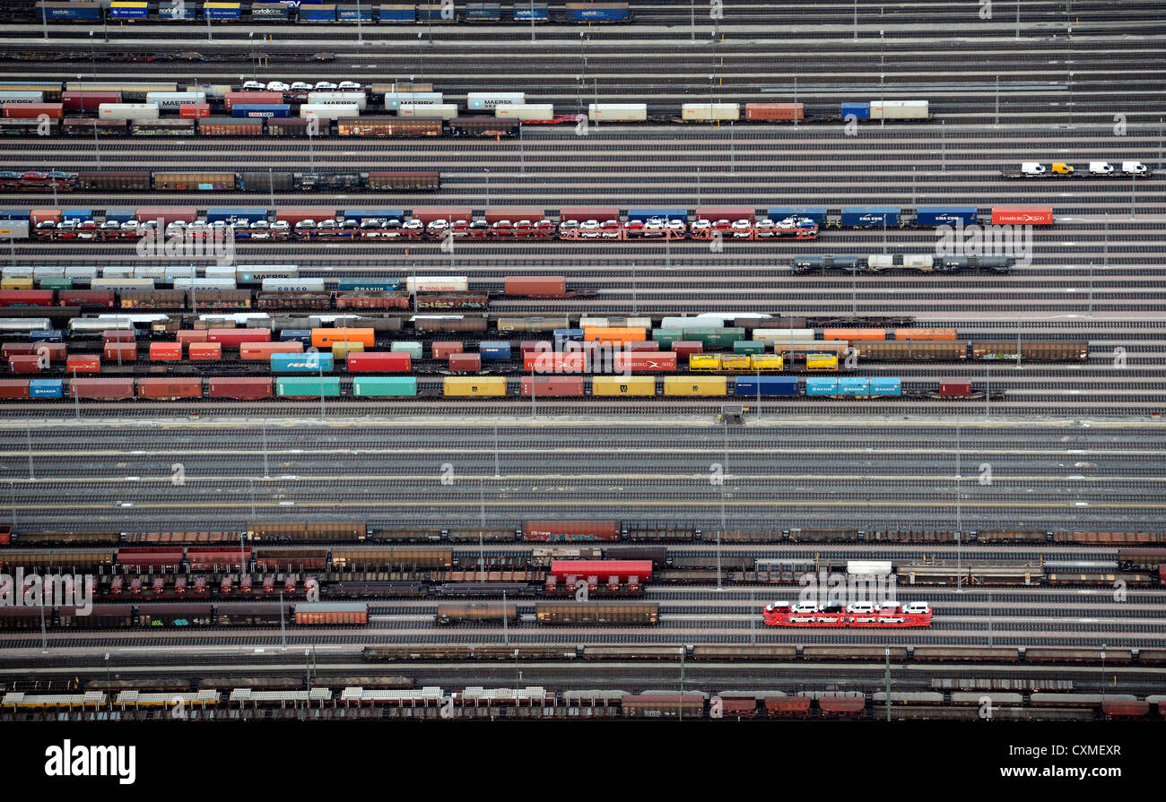 Cars and containers are loaded on freight trains at the railroad shunting yard in Maschen, near by Hamburg, Germany Stock Photo