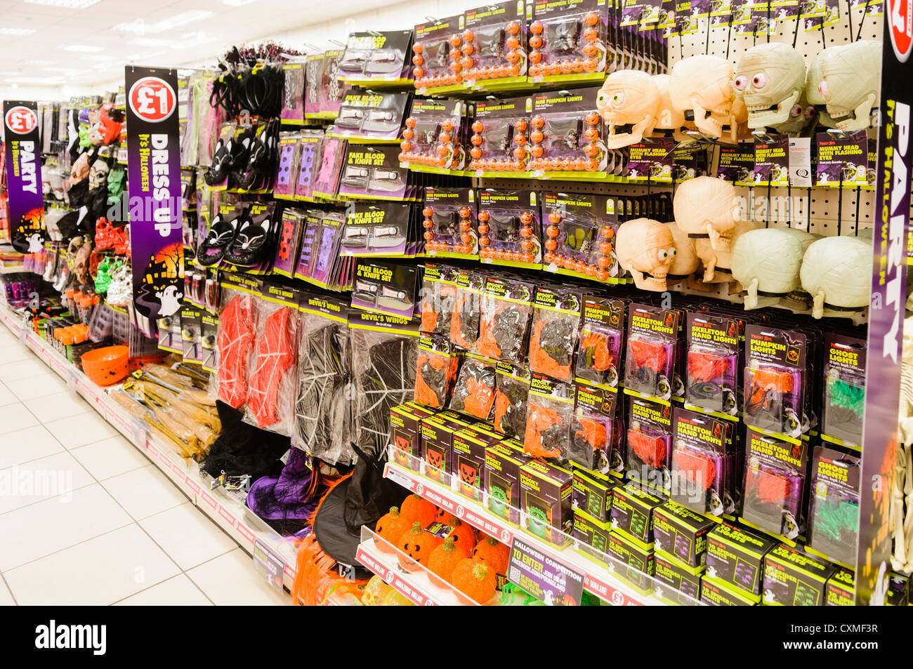 Seasonal Halloween goods on sale on the shelves in a Poundland shop