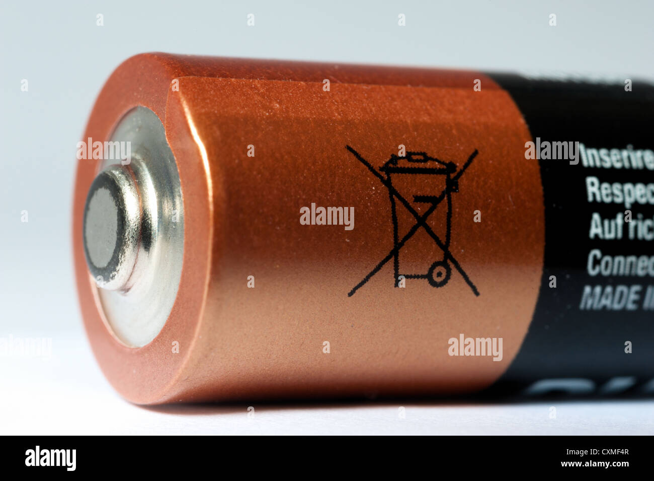 A battery with its recycle image Stock Photo