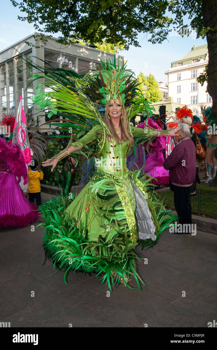 Lady showing off her carnival costume at the Helsinki Samba Carnival in  Esplanadi park, Helsinki Stock Photo - Alamy