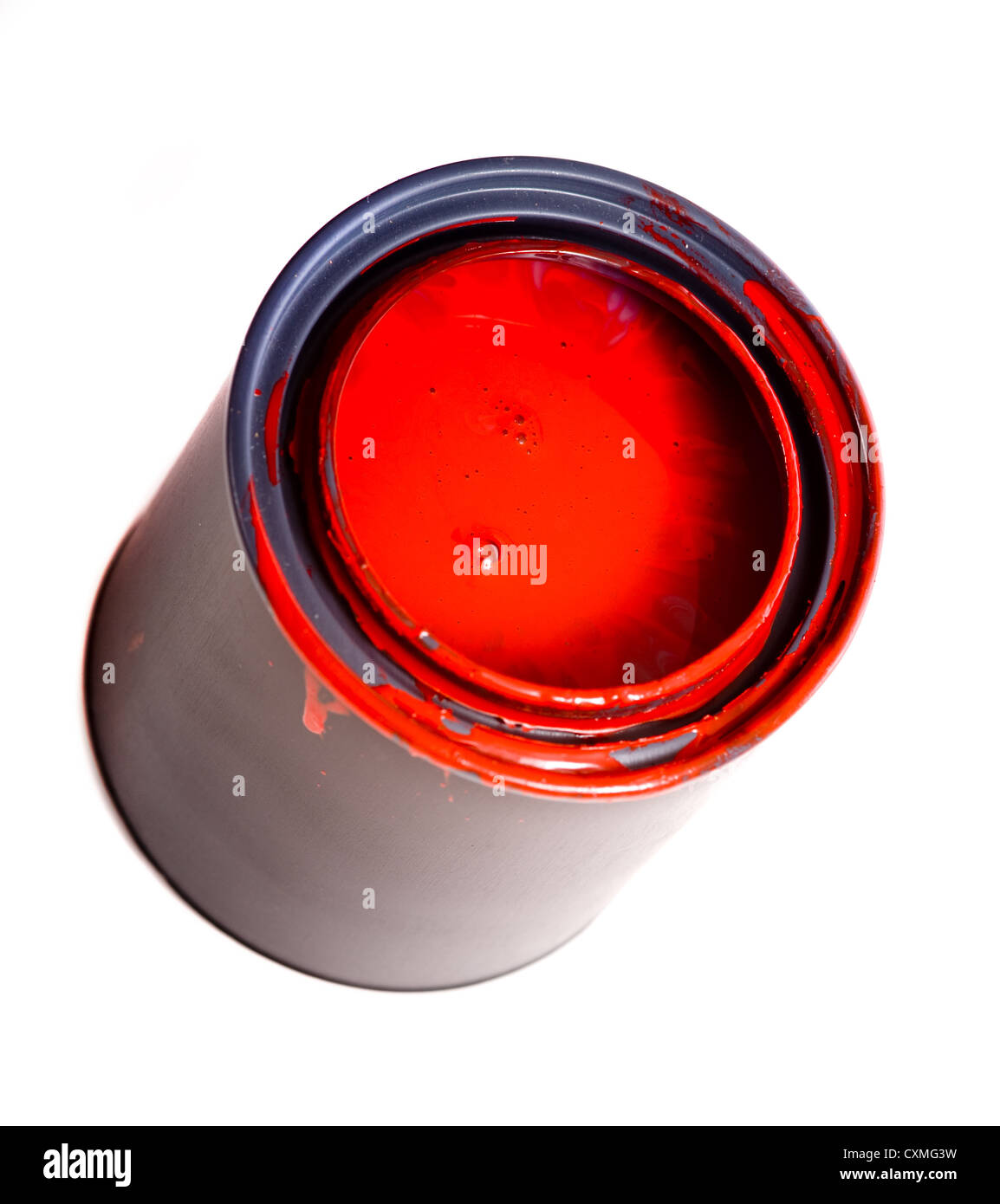 Colorful can of red paint on a white background with space for copy etc