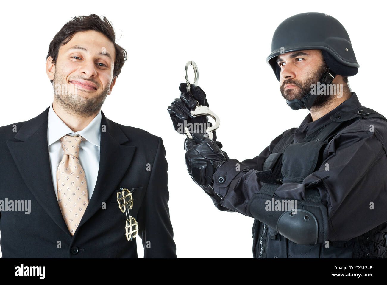 a corrupted businessman being arrested by a swat agent Stock Photo