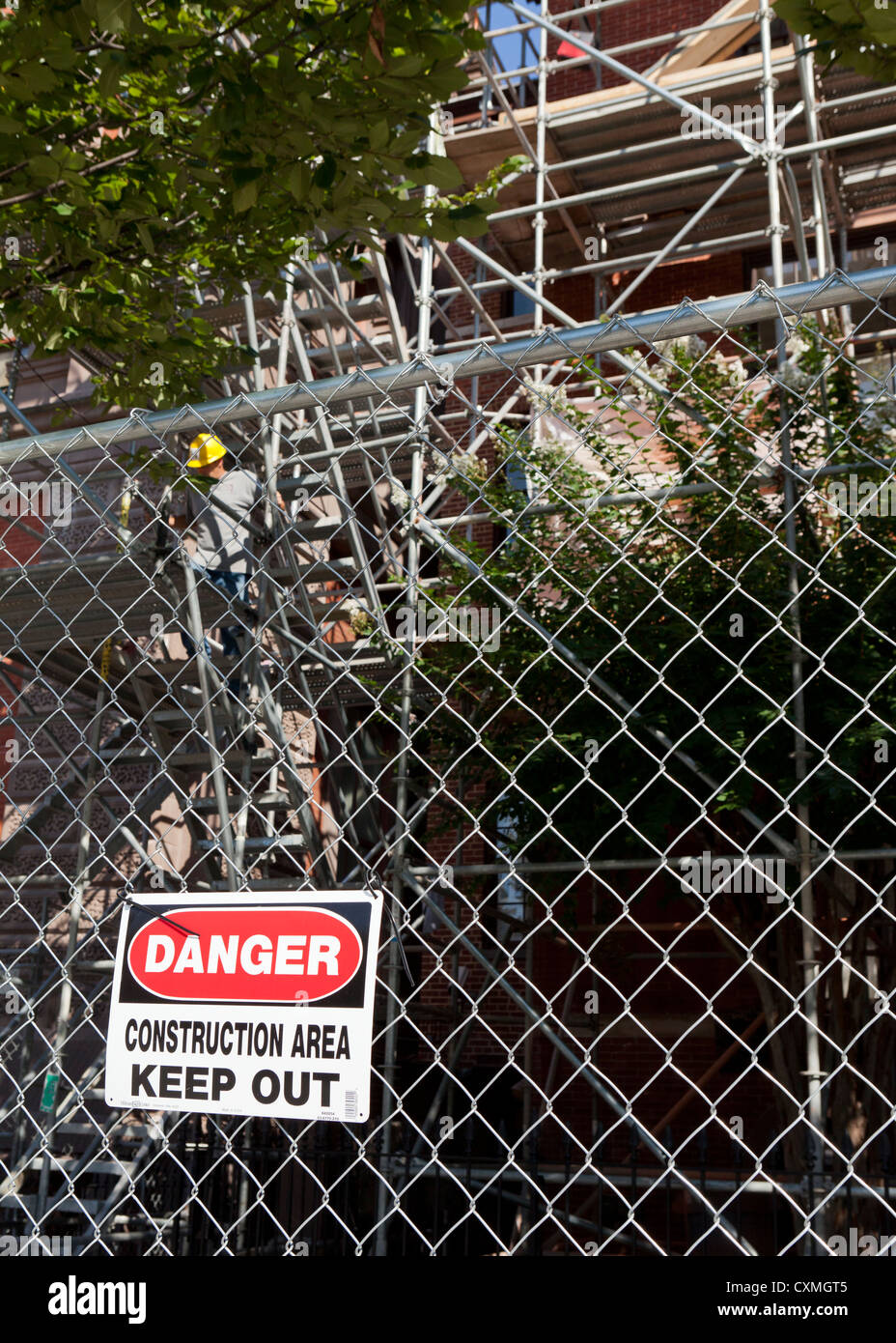 Danger sign on fenced construction area Stock Photo
