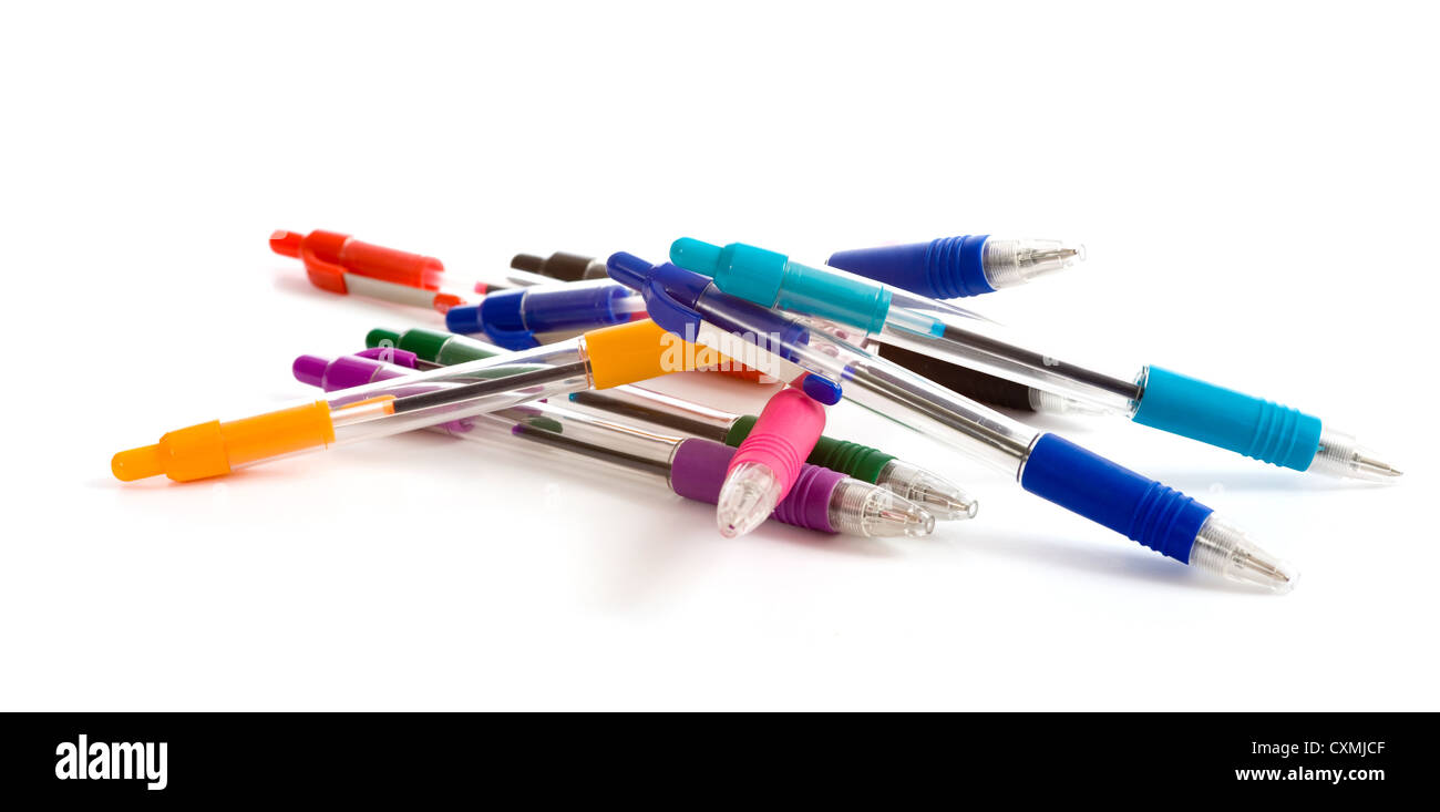 a background of brightly colored pens lying on a white surface on a white background Stock Photo