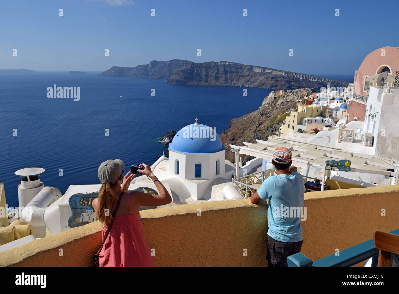 View of church dome and sea, Oia, Santorini, Cyclades, South Aegean Region, Greece Stock Photo