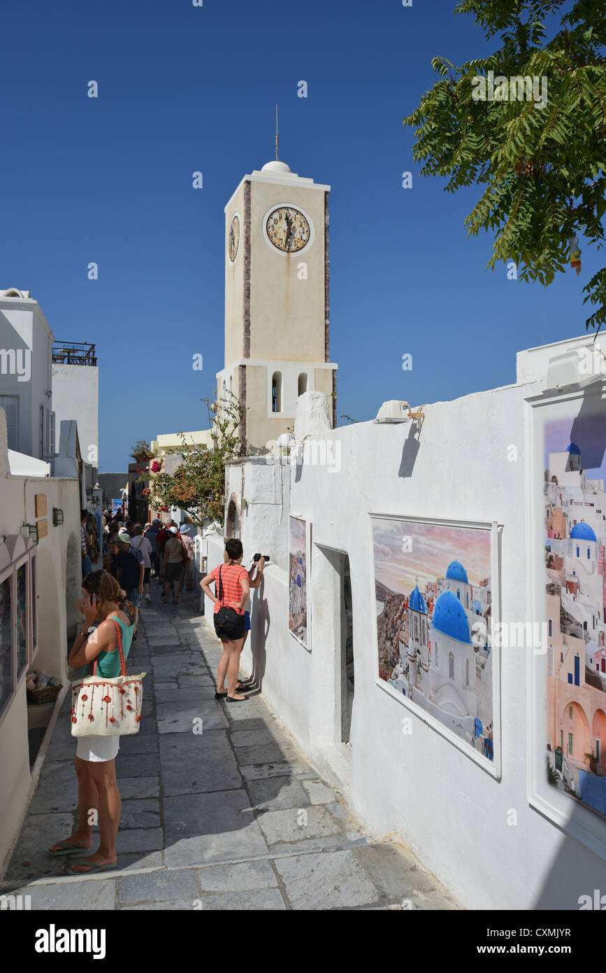 Street scene showing clock tower, Oia, Santorini, Cyclades, South Aegean Region, Greece Stock Photo