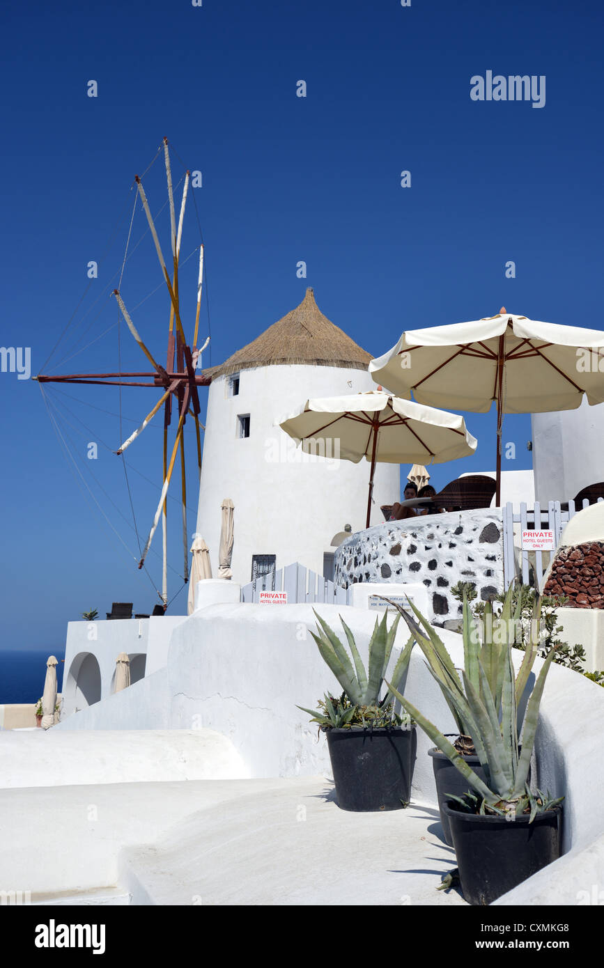 Windmill and terrace, Oia, Santorini, Cyclades, South Aegean Region, Greece Stock Photo