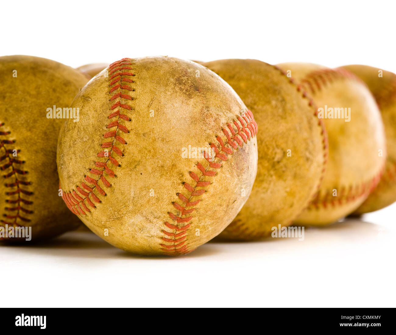 a background of vintage, antique, old baseballs on a white background with copy space Stock Photo