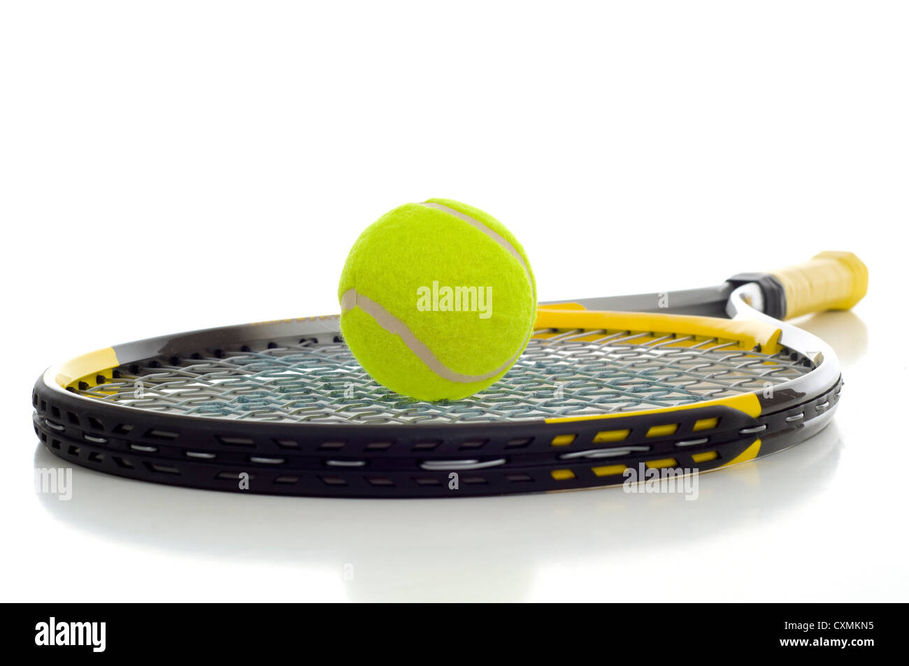 Tennis ball and racket on white background with copy space Stock Photo