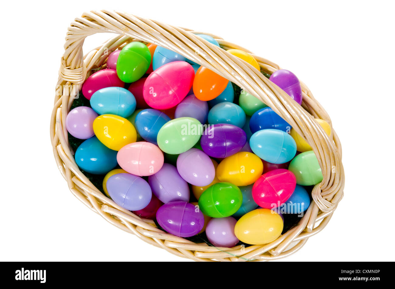 Basket of brightly colored Easter eggs on a white background Stock ...