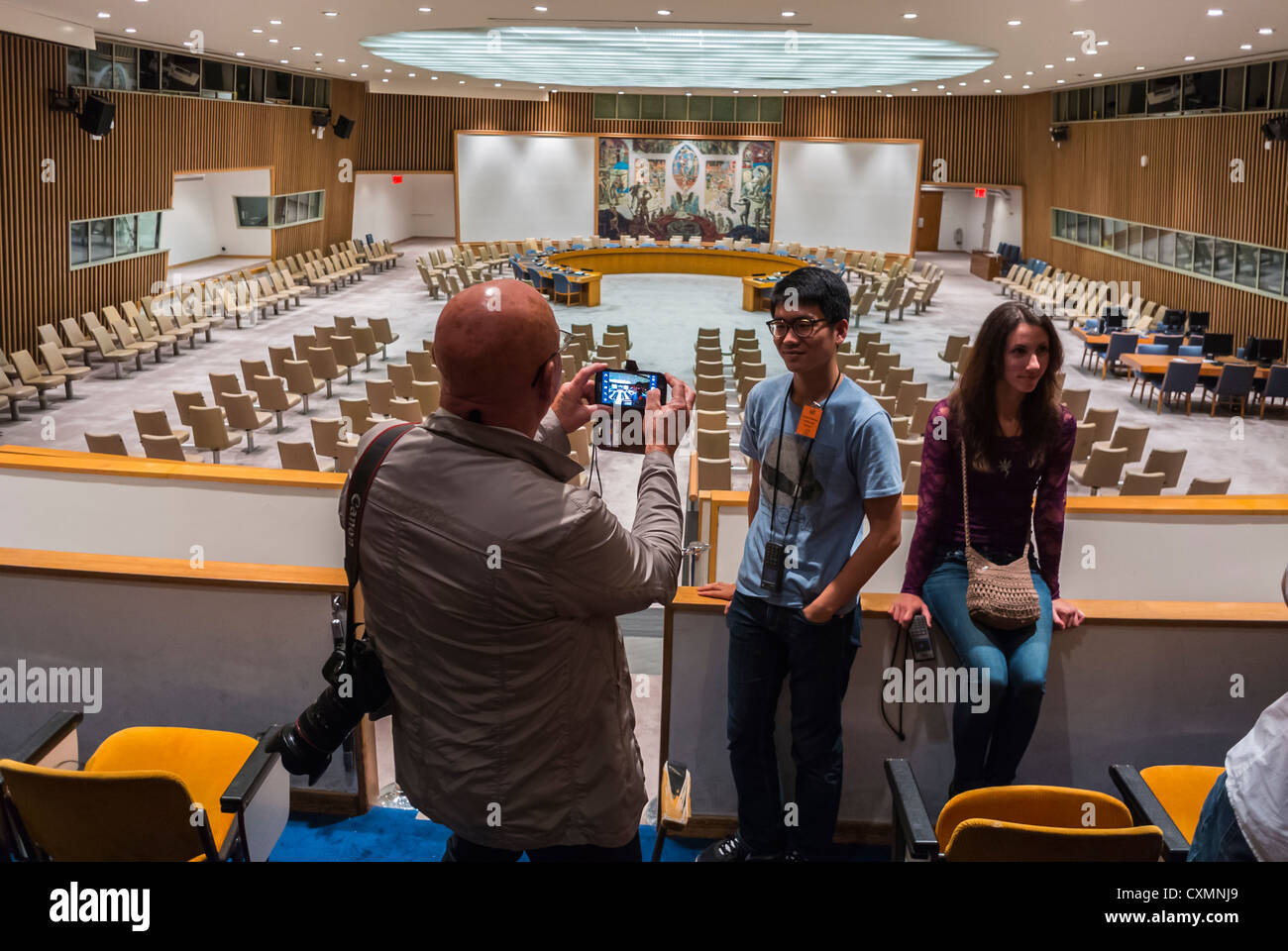 New York, Tourists Visiting U.N. United Nations Building, Manhattan, Security Council Meeting Room, Interior Stock Photo