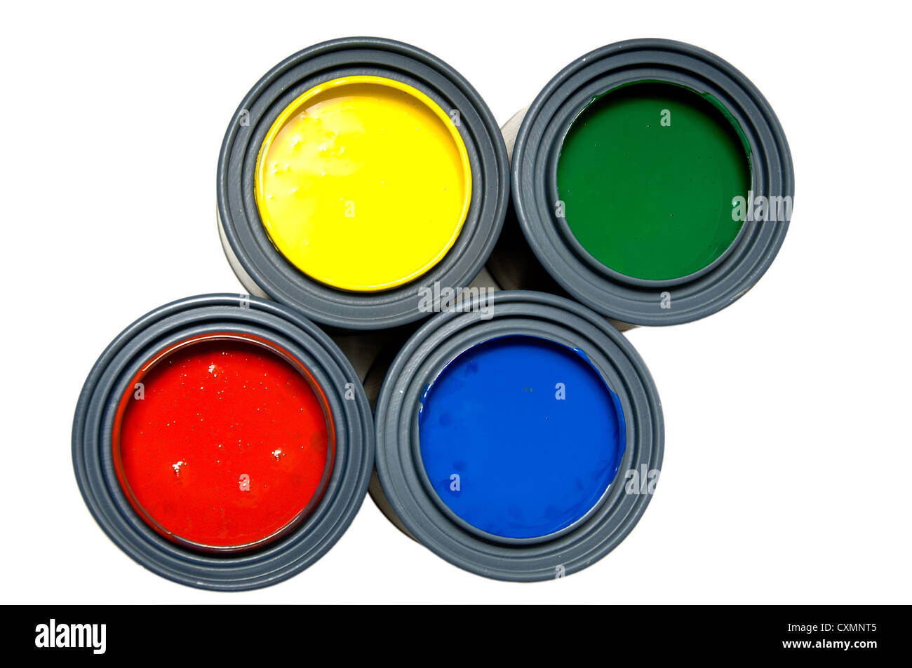 Four primary colored cans of paint on white background Stock Photo