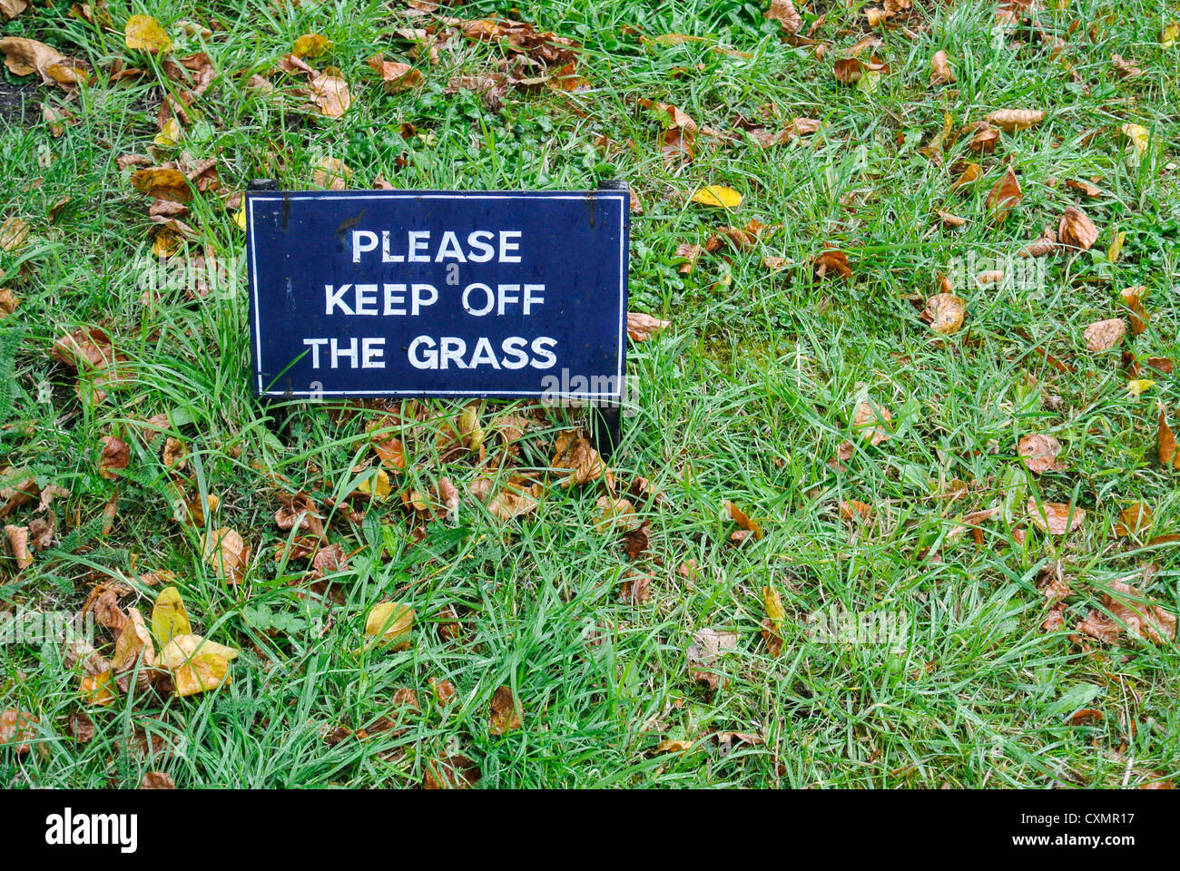 Please Keep off the Grass sign Stock Photo