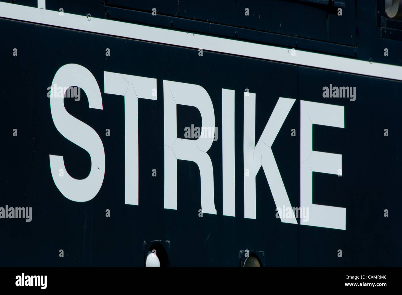 Scoreboard signage with the word STRIKE at a baseball or softball field Stock Photo