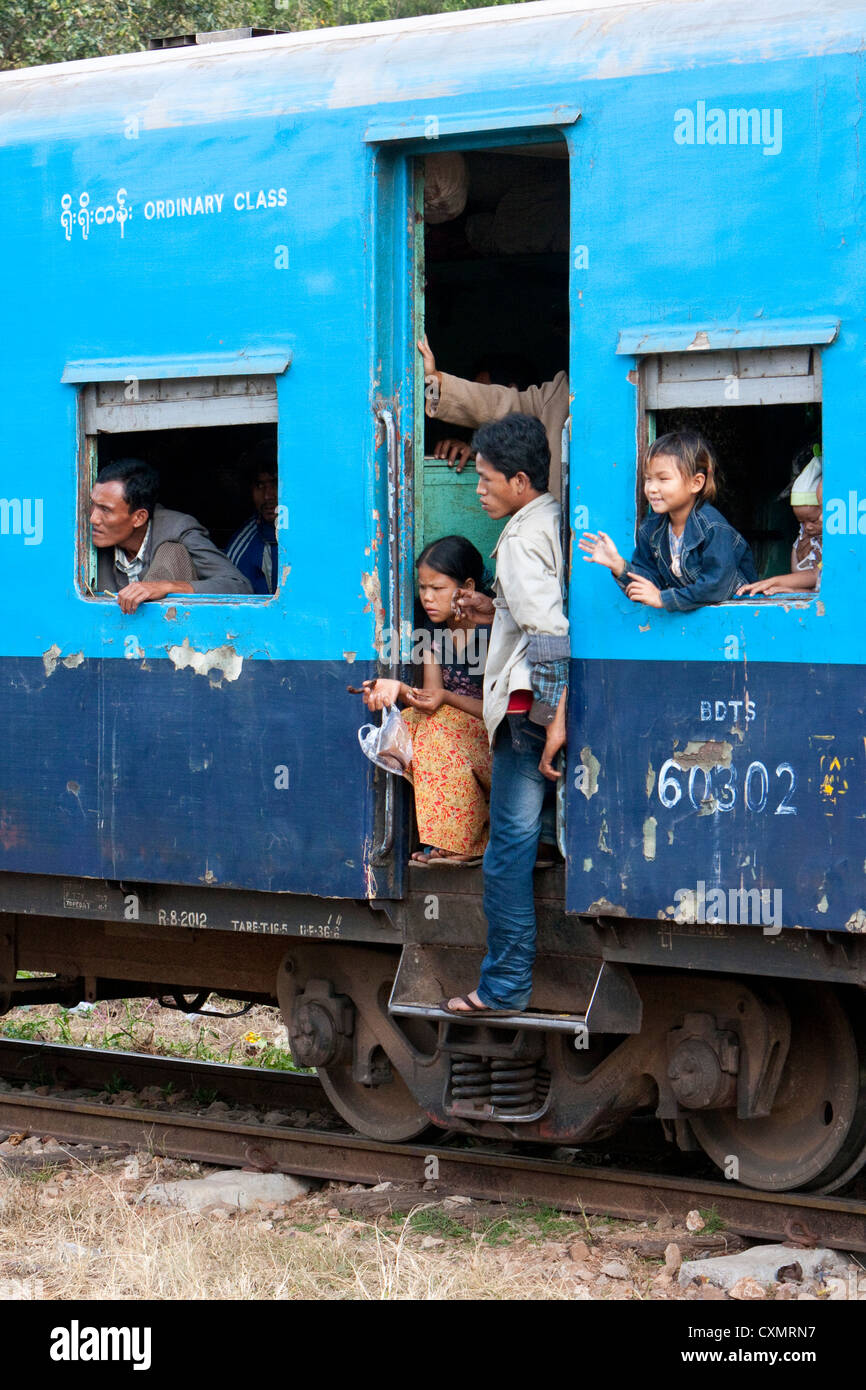 Myanmar, Burma. Passengers on Train at Kalaw Train Station. 'Ordinary Class' Coach. Stock Photo