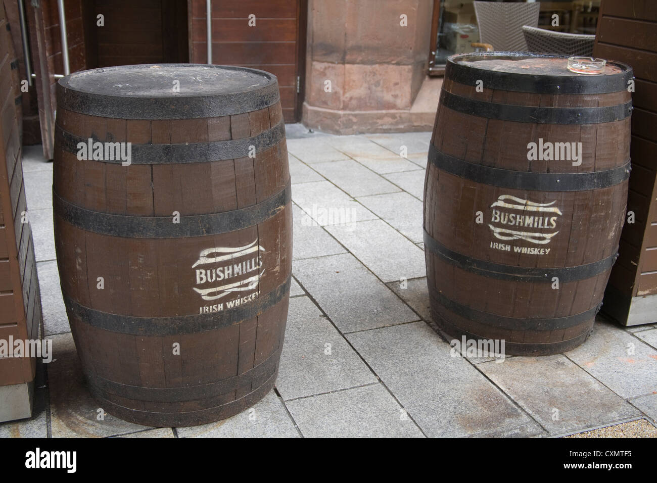 Northern Ireland Two Bushmills Irish Whisky barrels outside a pub used