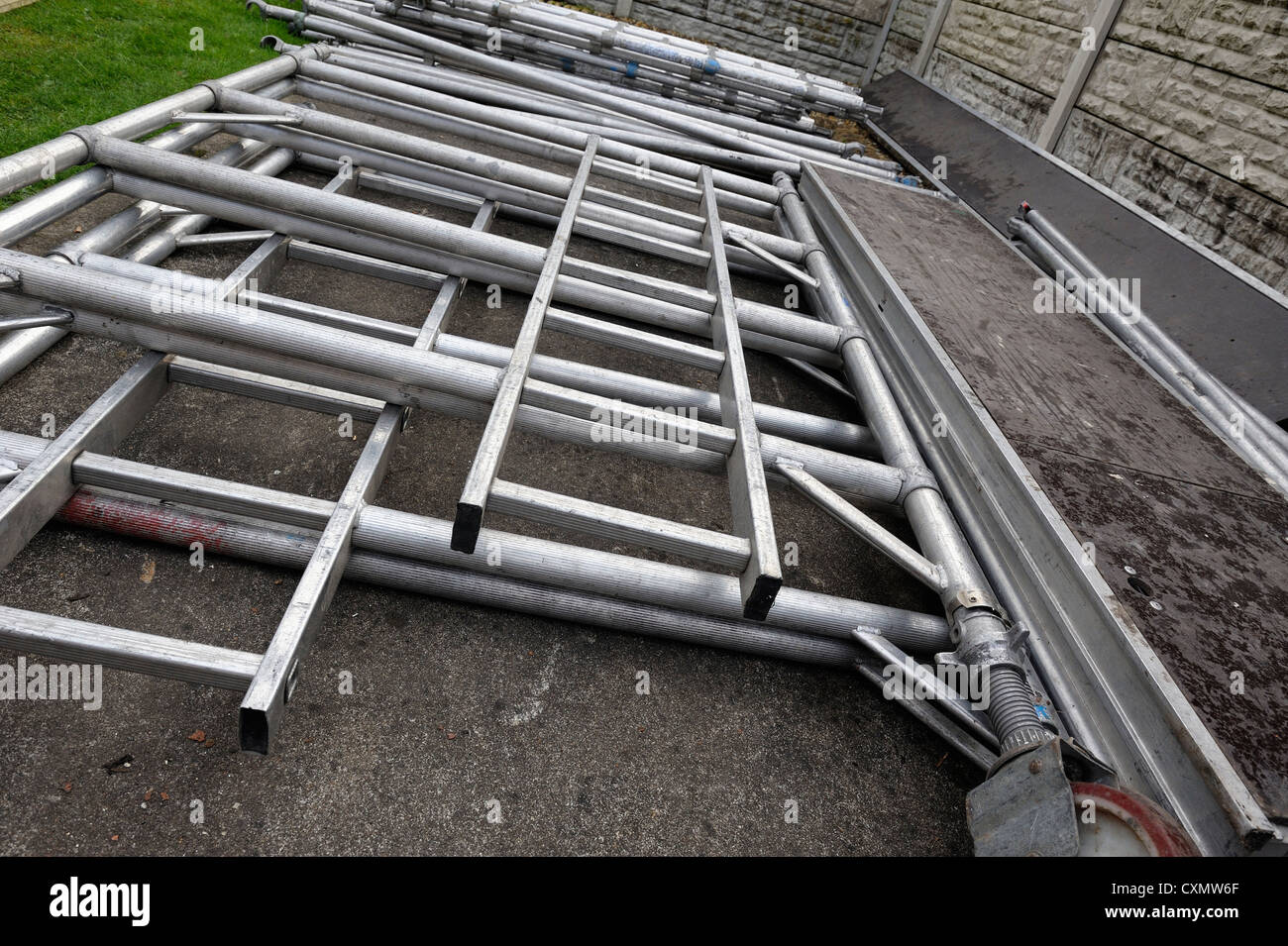 mobile scaffold towers in a yard england uk Stock Photo
