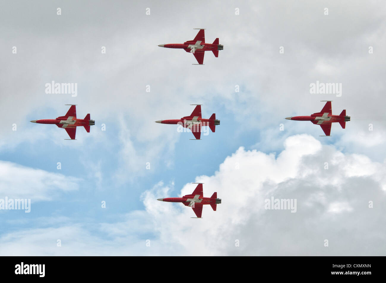 Patrouille Suisse Aerobatic Display Team in their Northrop F-5E Tiger II's fly past in formation at the 2012 RIAT Stock Photo