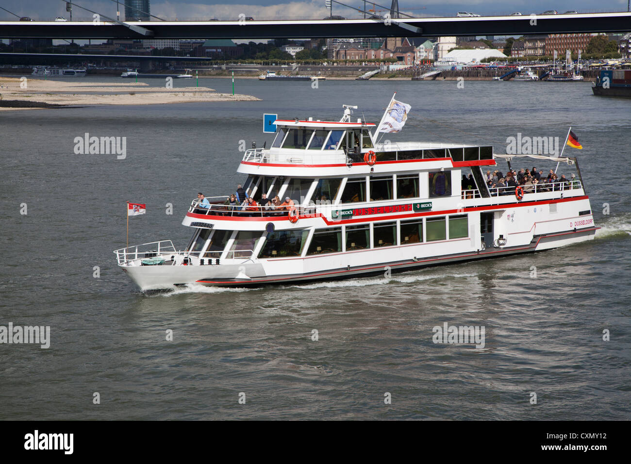 Rhine river cruise boat Dusseldorf operating on the river in Dusseldorf. Stock Photo