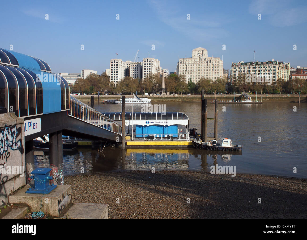 Festival Pier on the south bank of the River Thames. Across the river are  The Adlephi, Shell Mex House, Savoy Hotel, Cleopatra Stock Photo