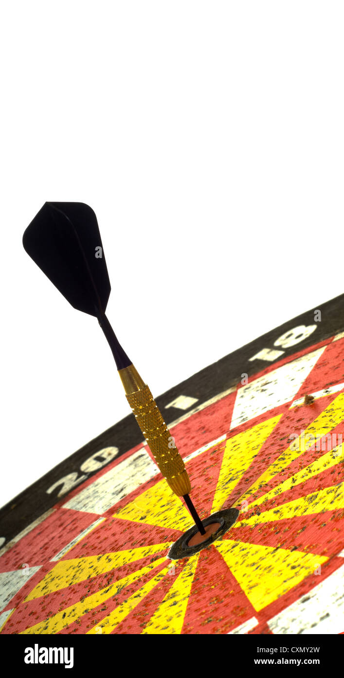 Dartboard with single dart in the middle or bulls -eye. symbol of hitting the target or making the goal Stock Photo