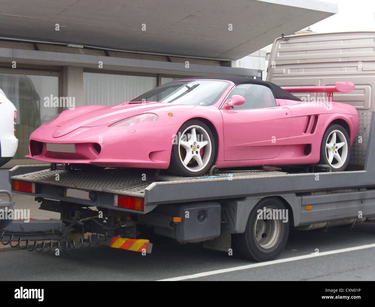 A Ferrari Convertible In Pink Stock Photo Alamy