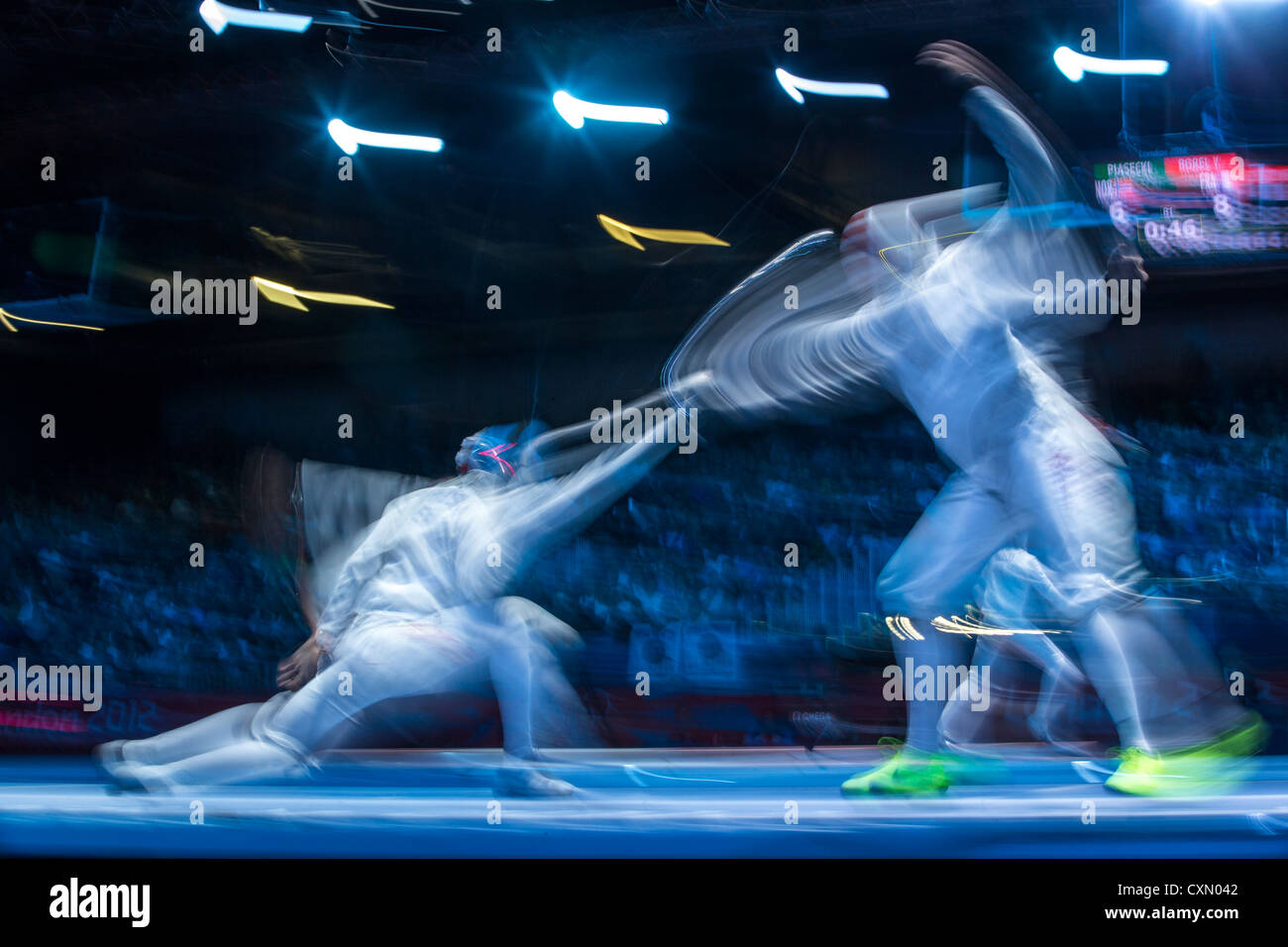 Blurred action of fencing competition. Stock Photo