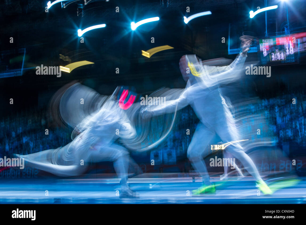 Blurred action of fencing competition. Stock Photo