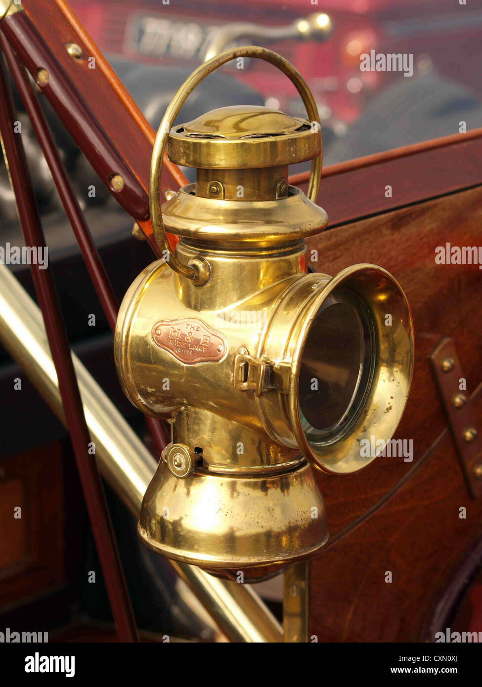 1910 Straker-Squire headlight. Th H & B side lamp. Stock Photo
