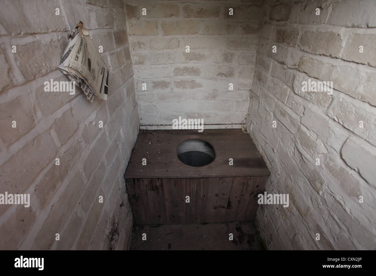 Early working class toilet of the soil type in a good preserved state. Stock Photo