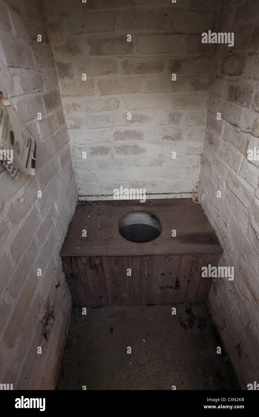 Early working class toilet of the soil type in a good preserved state. Stock Photo