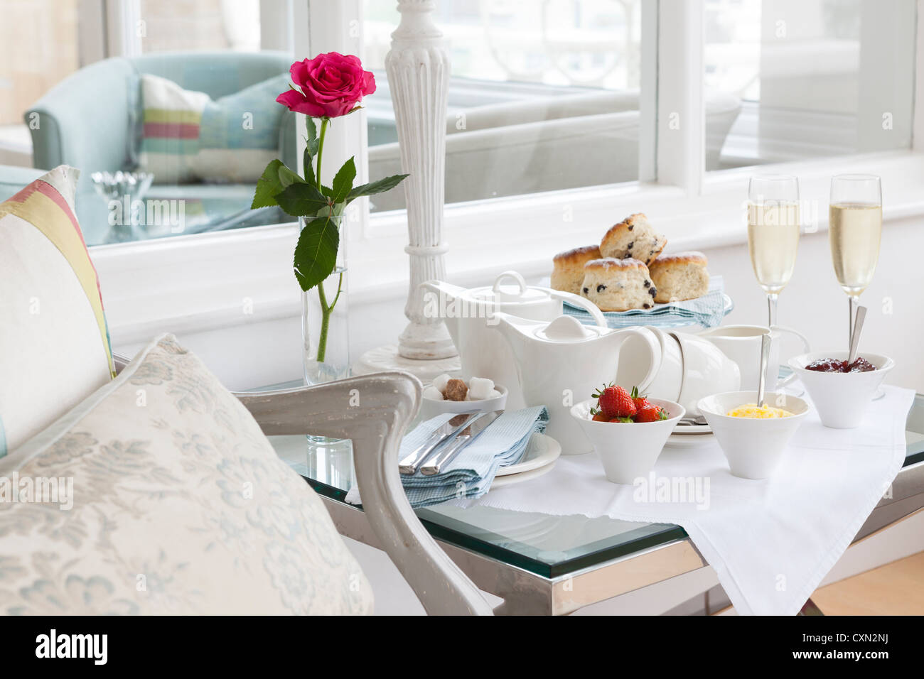 Romantic cream tea in Cornwall with strawberries and champagne Stock