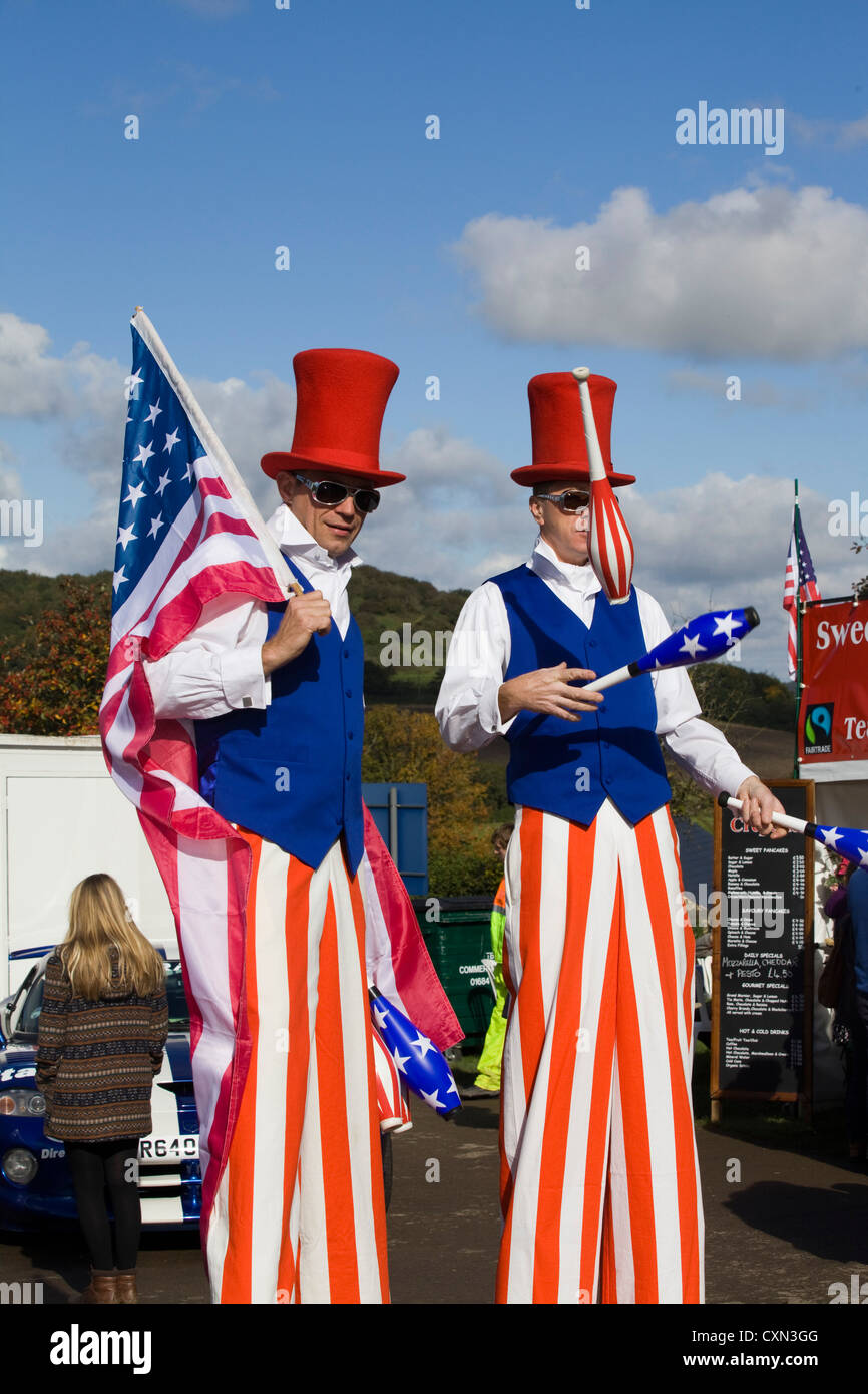 Men dressed in the All American Flag on Stilts Stock Photo