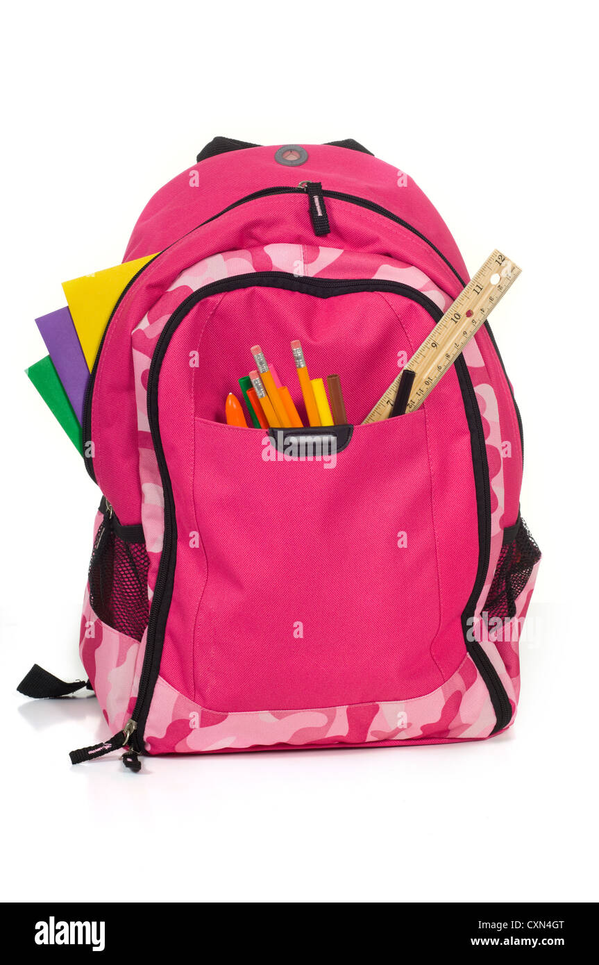Pink backpack with school supplies on white background with folders
