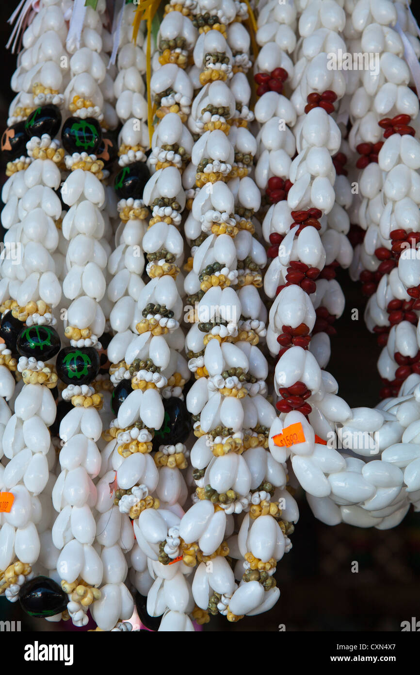 A lei is any series of objects strung together with the intent to be worn usually flowers or shells. Stock Photo