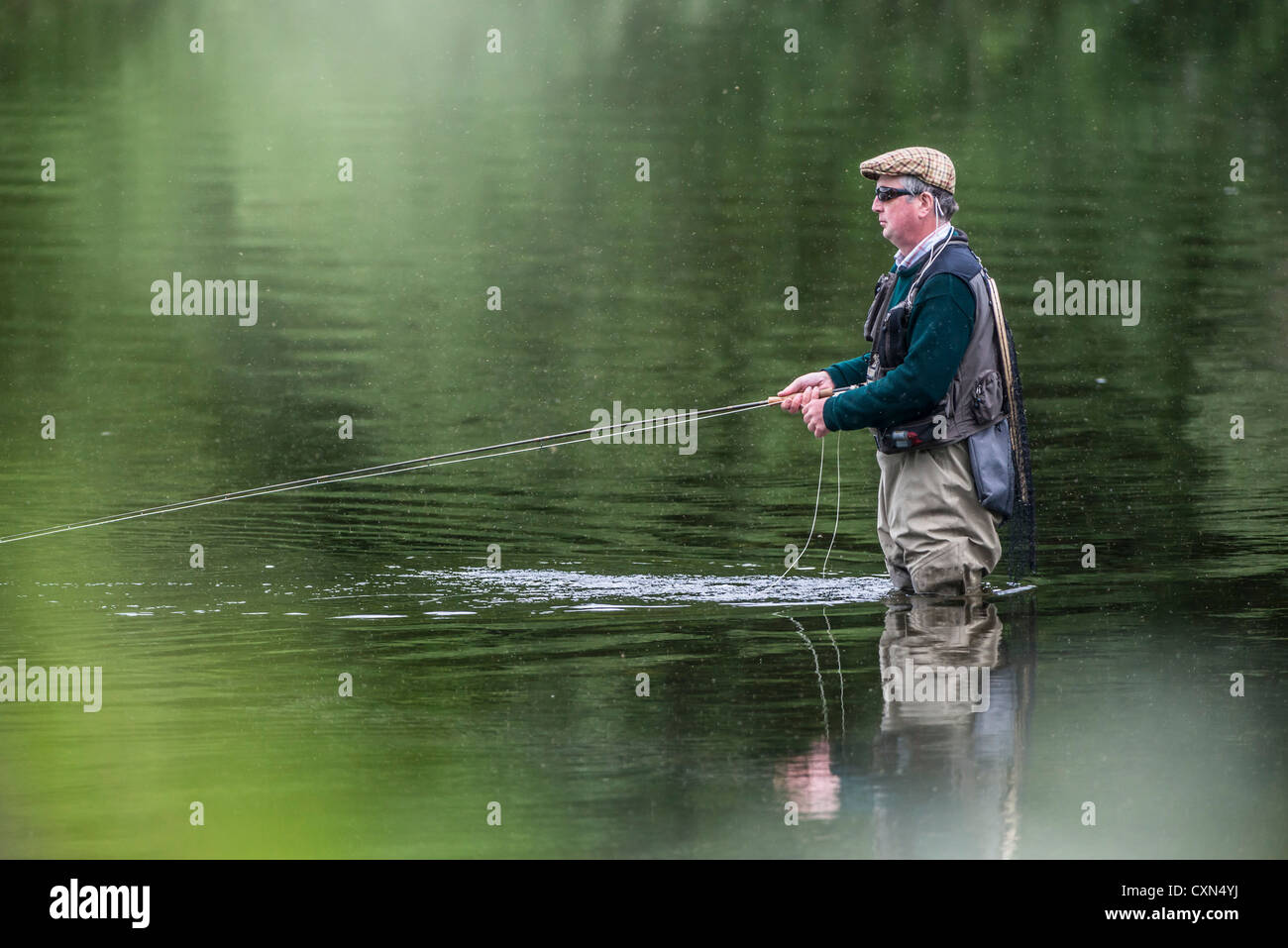 Casting on the River Tweed in June, in Scotland Stock Photo