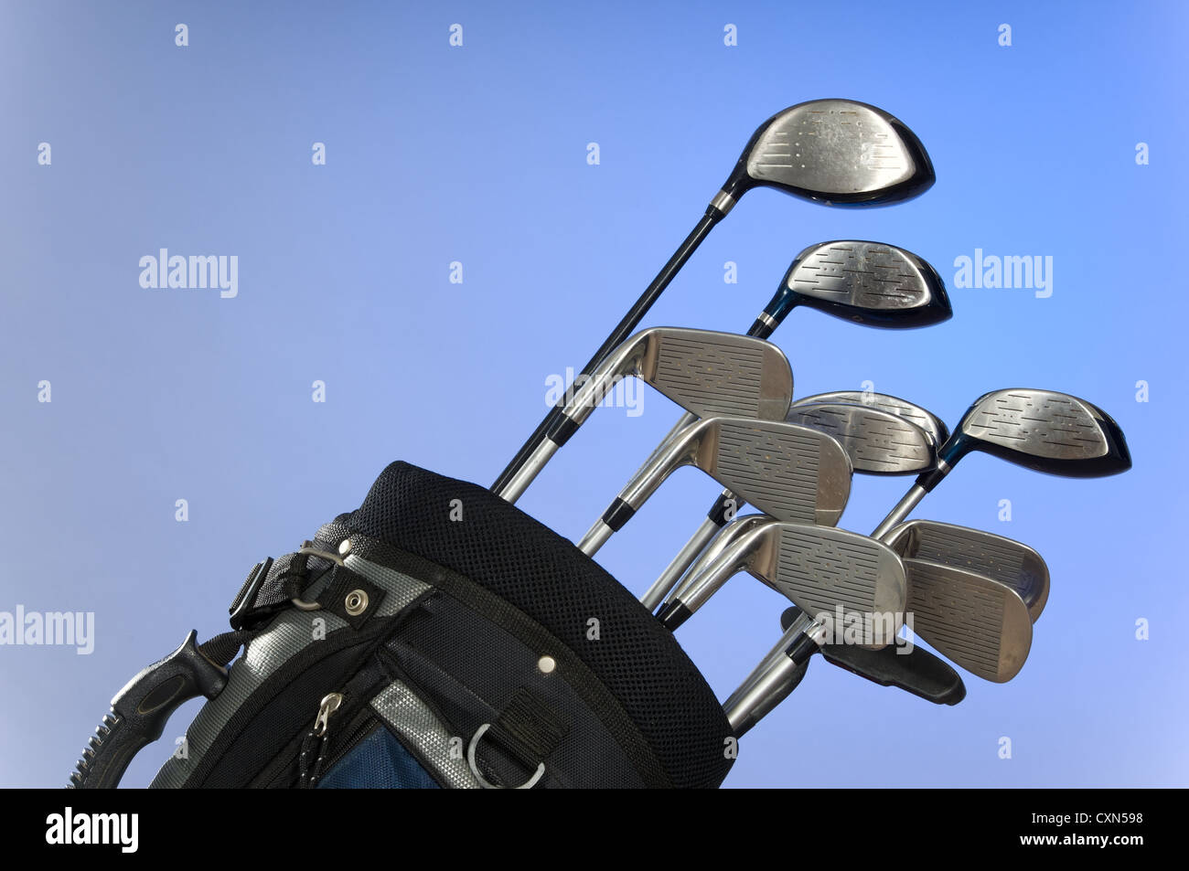 Golf club on blue background - great for background Stock Photo