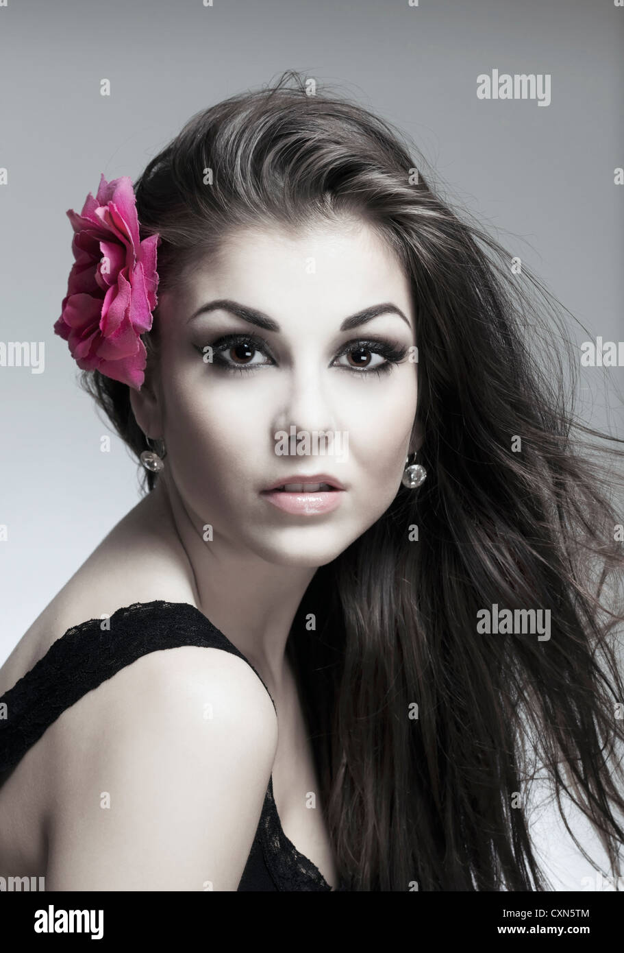 portrait of a young beautiful woman with dark hair looking Stock Photo