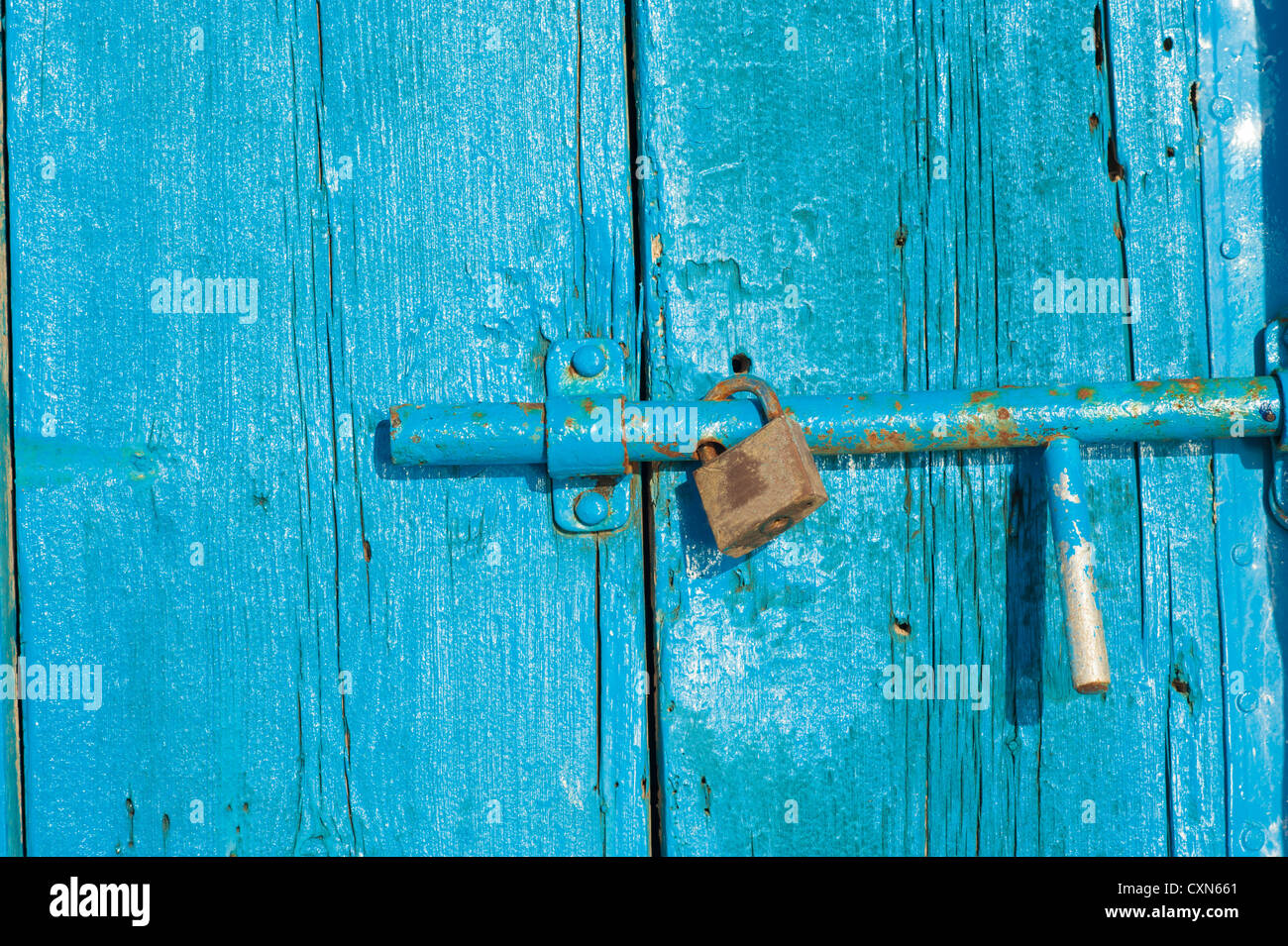 Detail take of an old wooden door and its lock Stock Photo - Alamy