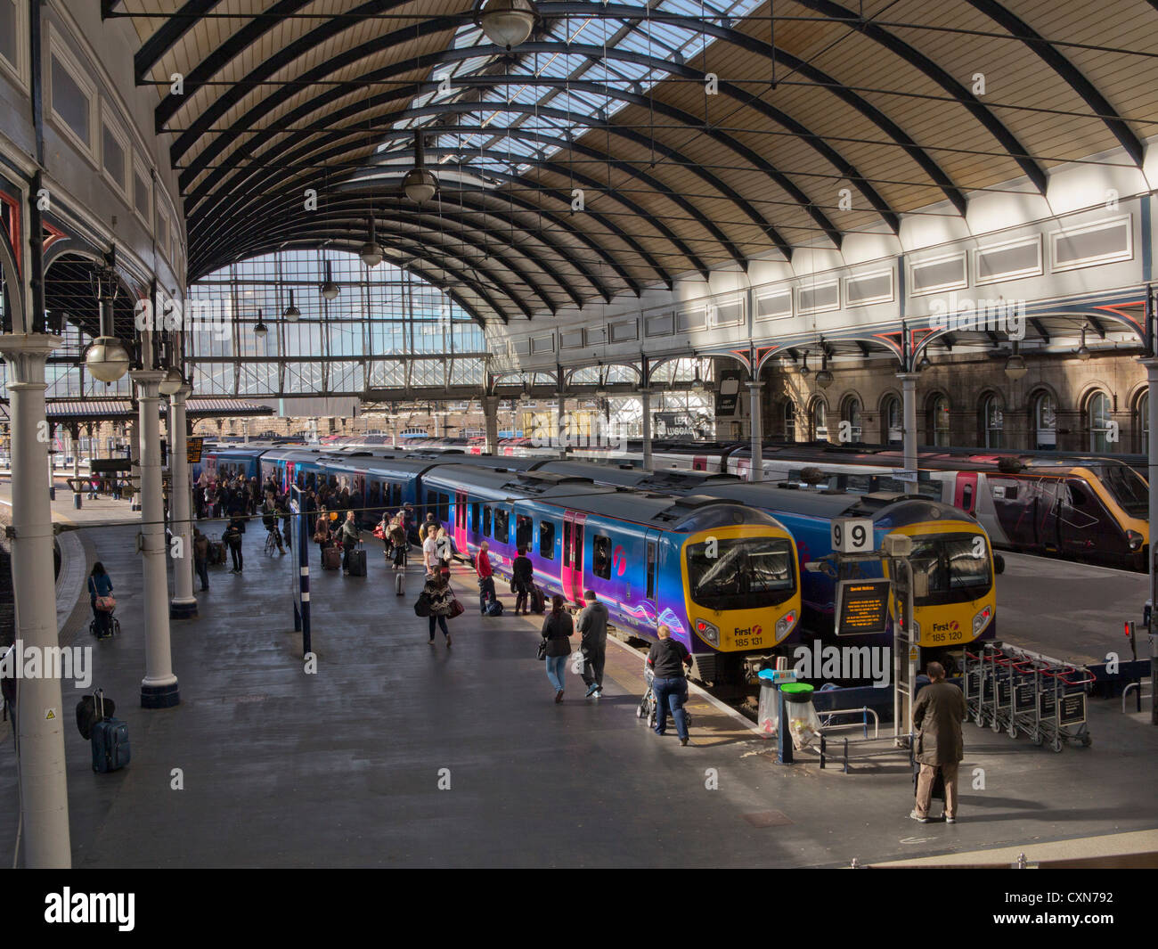 Passengers at the train station in NewcastleuponTyne, England, UK