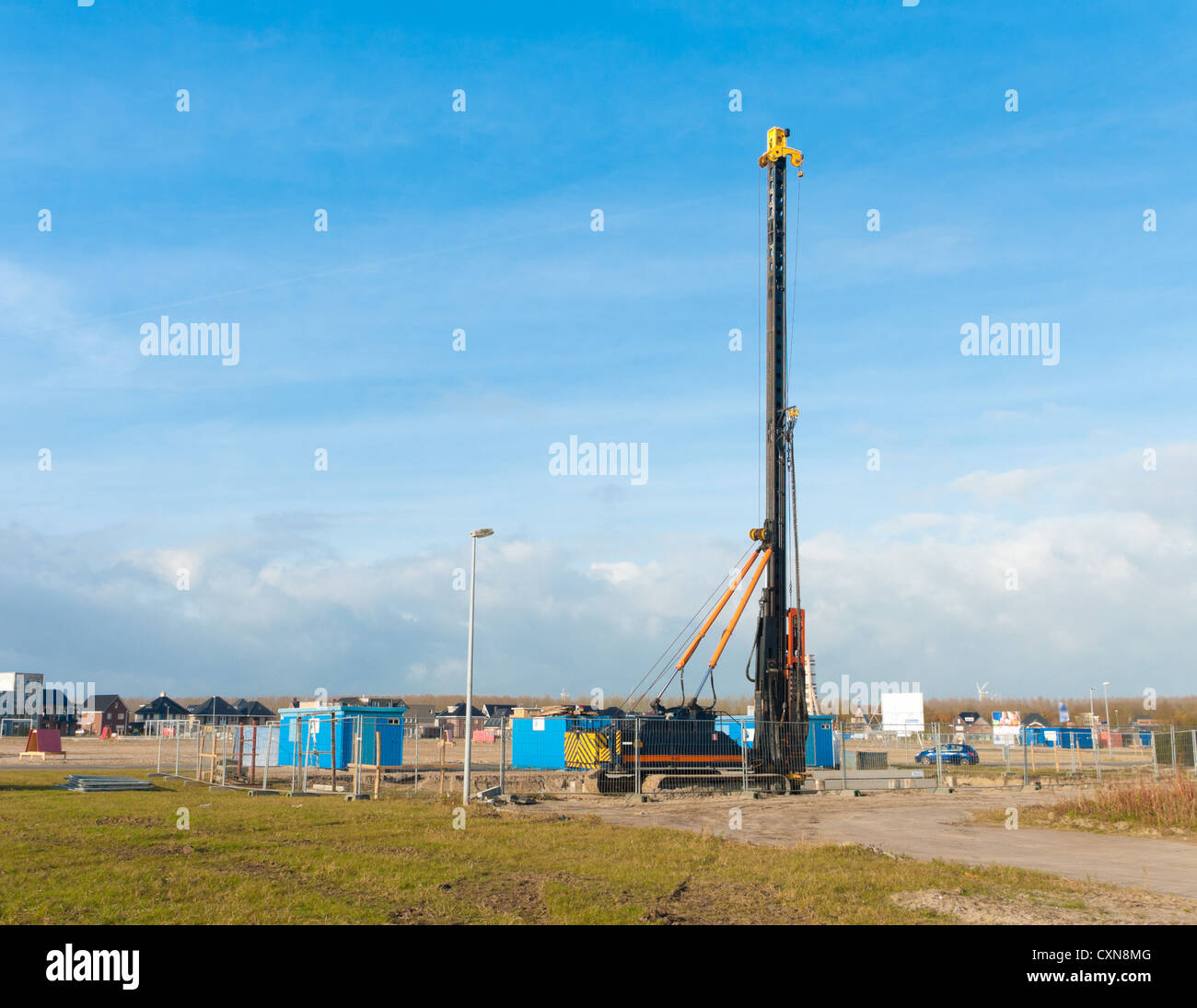 pile driver in a newly build residential area Stock Photo
