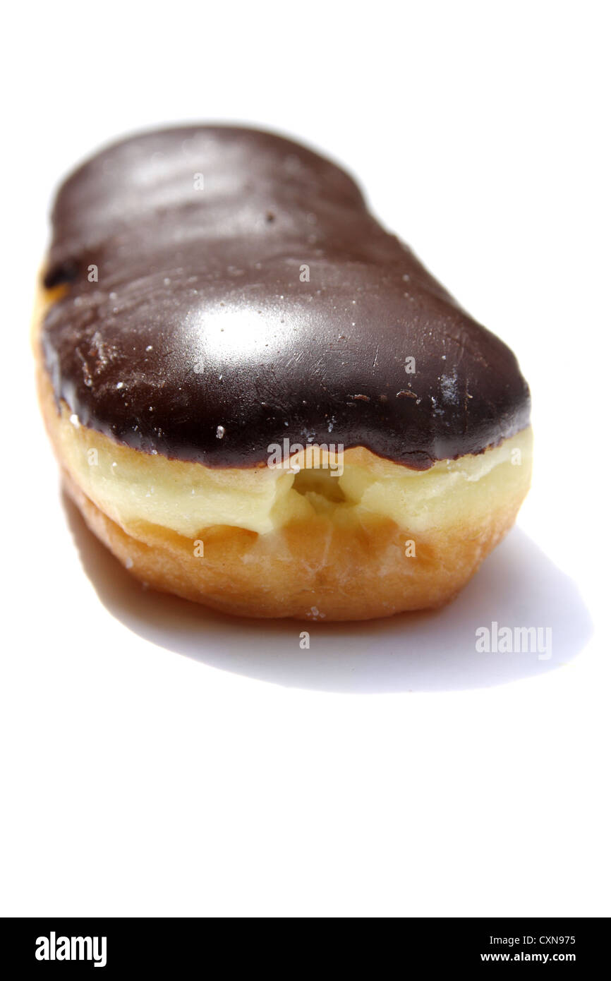 Chocolate cream filled donut on white background Stock Photo - Alamy