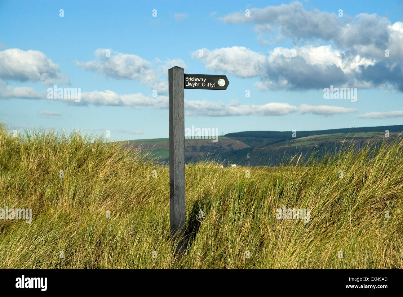 bridleway sign in english and welsh kenfig national nature reserver near porthcawl wales uk Stock Photo